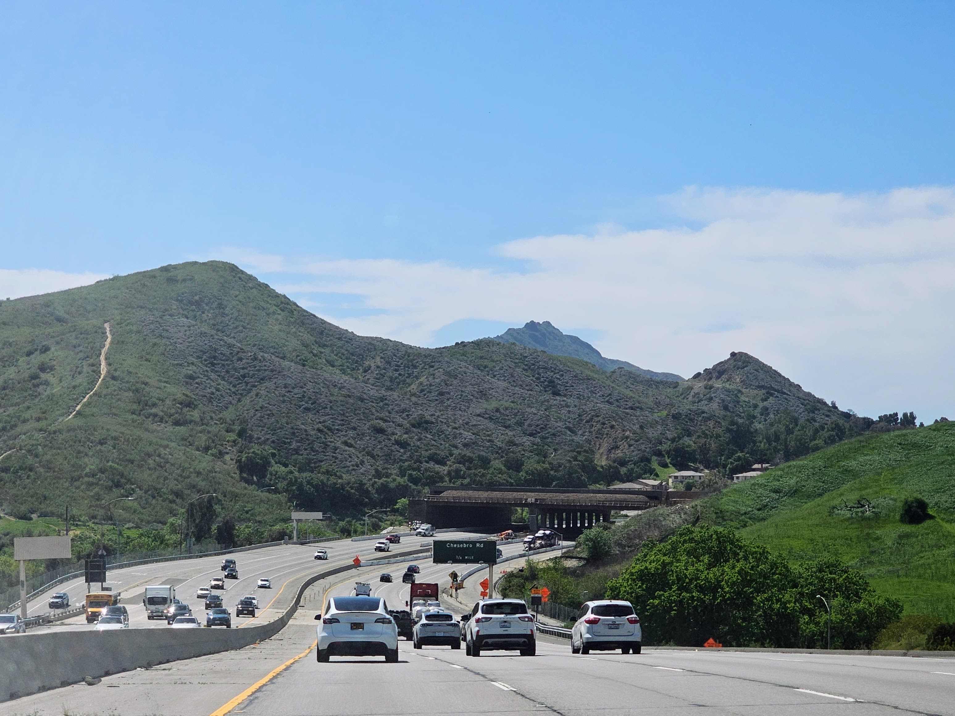 A view along US 101 toward the Wallis Annenberg Wildlife Crossing construction site and the Santa Monica Mountains.